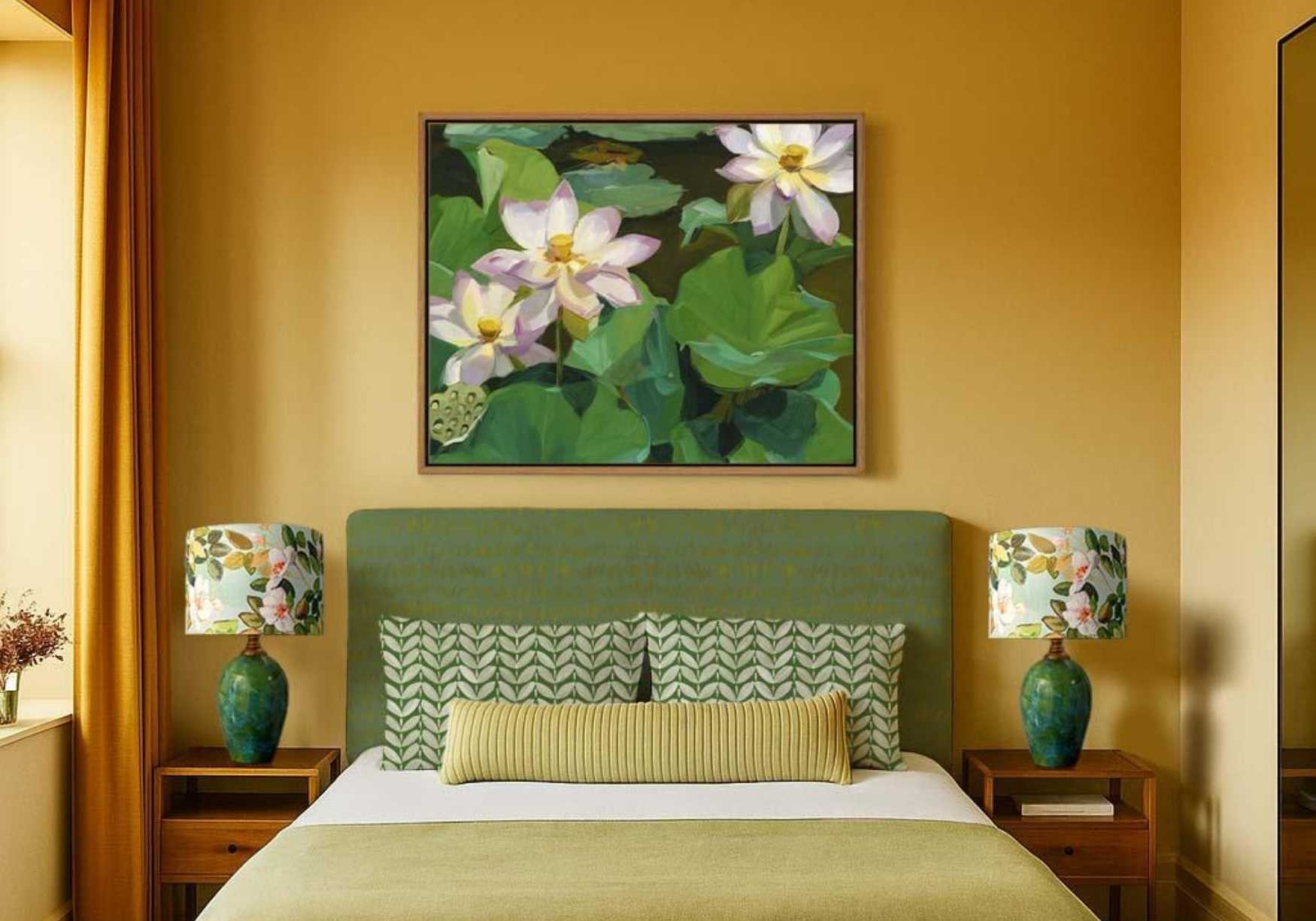 Bedroom with a painting, pillow covers and hand made 
lampshades